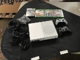 Xbox 1 videogame system, two controllers 4games and console cables