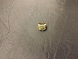 Large gold colored ring