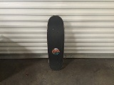 Joel Tudor pro black multi colored skateboard