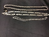 3 silver colored chains, 1 silver colored ring