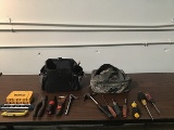 Black tool bag with misc tools, army strong tool bag with misc tools