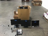 Box of assorted computer monitors with work phones