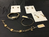 Bracelets, earrings gold colored