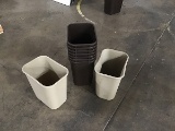 Nine brown mini trash cans