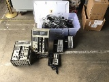 Box of assorted office phone systems