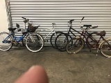 Blue bike,huffy cruiser brown,black bike,white bicycle