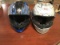 One scorpion exo motorcycle helmet with one Bell Motorcycle helmet
