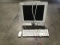 Apple computer monitor with keyboard and mouse