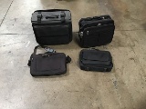 Four black laptop cases