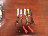 Twelve assorted flashlights