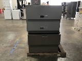 Four metal filing cabinets