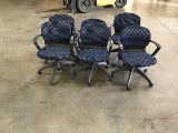 Six blue office chairs