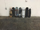 Seven assorted skateboards
