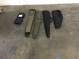 Two pistol cases and four rifle cases