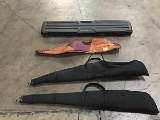 Four rifle cases
