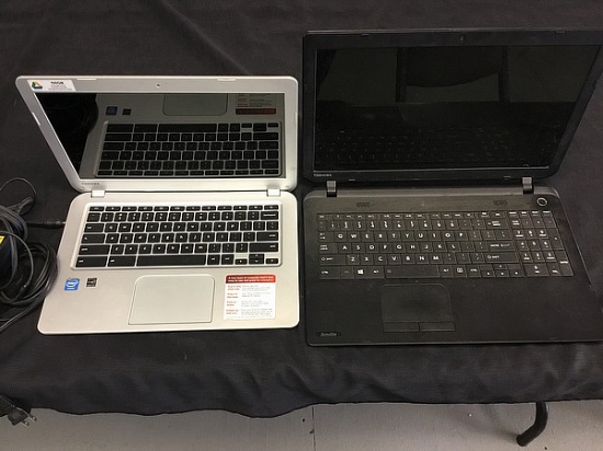 2 TOSHIBA laptops with plugs,hard drives possibly removed,