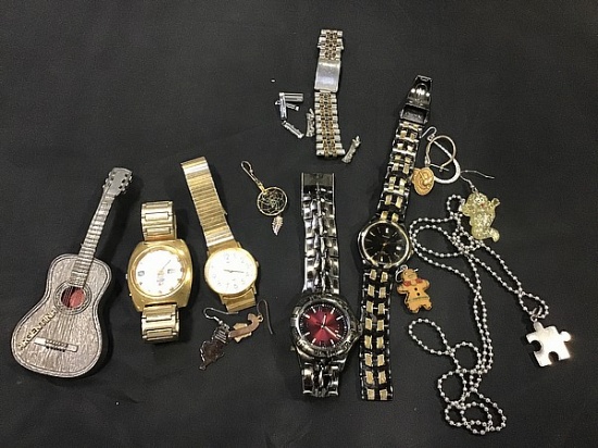 Four watches with misc jewelry