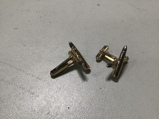 Two bullet cuff links