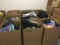 9 Boxes of  backpacks, clothes, books, purses, toys