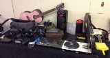 Cameras, acoustic guitars, dj hero mixers, walkie talkies, Apple TV, speakers, DVD player