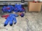 Box of skydiving helmets with two pallets of skydiving jumpsuits
