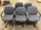 Five blue office chairs