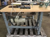 Two sewing machine tables (parts)