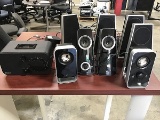 Four sets of computer speakers and Ihome speaker