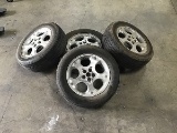 Four van tires with rims