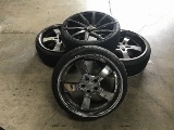 Four tires with rims