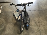 One (part) motorized scooter with mongoose bikeboard