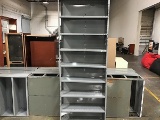 Four metal shelving racks