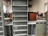 Four metal shelving racks