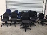 Eleven assorted office chairs