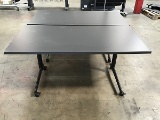Two gray top office tables