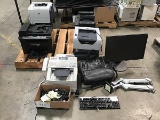 pallets of printers, keyboards, computer monitor arm stands