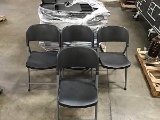 Pallet of black folding chairs