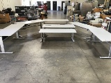 Six adjustable tables with one electric table
