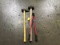 One wood handle sledge hammer, 1 set of red bolt cutters, 8lb yellow handheld black end axe