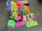 Box of party supplies (Table covers, decorating kit, rainbow leis)