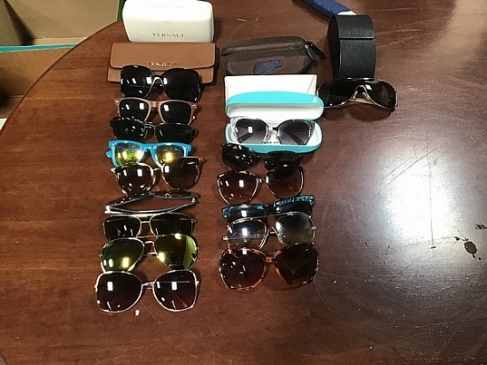 Assorted sunglasses and cases