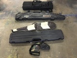 Black flamebeau shotgun case with two pistol cases, Black explorer rifle case, Remington rifle case,