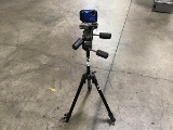 Blue fujifilm xp digital camera, black tripod