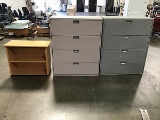 Two four drawer file cabinets with bookshelf