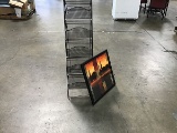 Picture frame with magazine rack