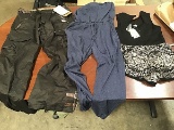 Two women’s jumpsuits with women’s black snow pants