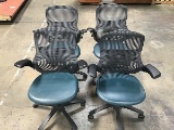 Four office chairs