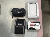 Bushnell golf range finder, portable power bank, Samsung digital camera