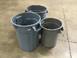 3 plastic garbage cans