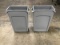 Two plastic trash cans